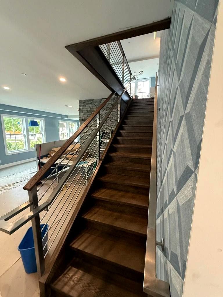 Custom steel railing for a feature stair