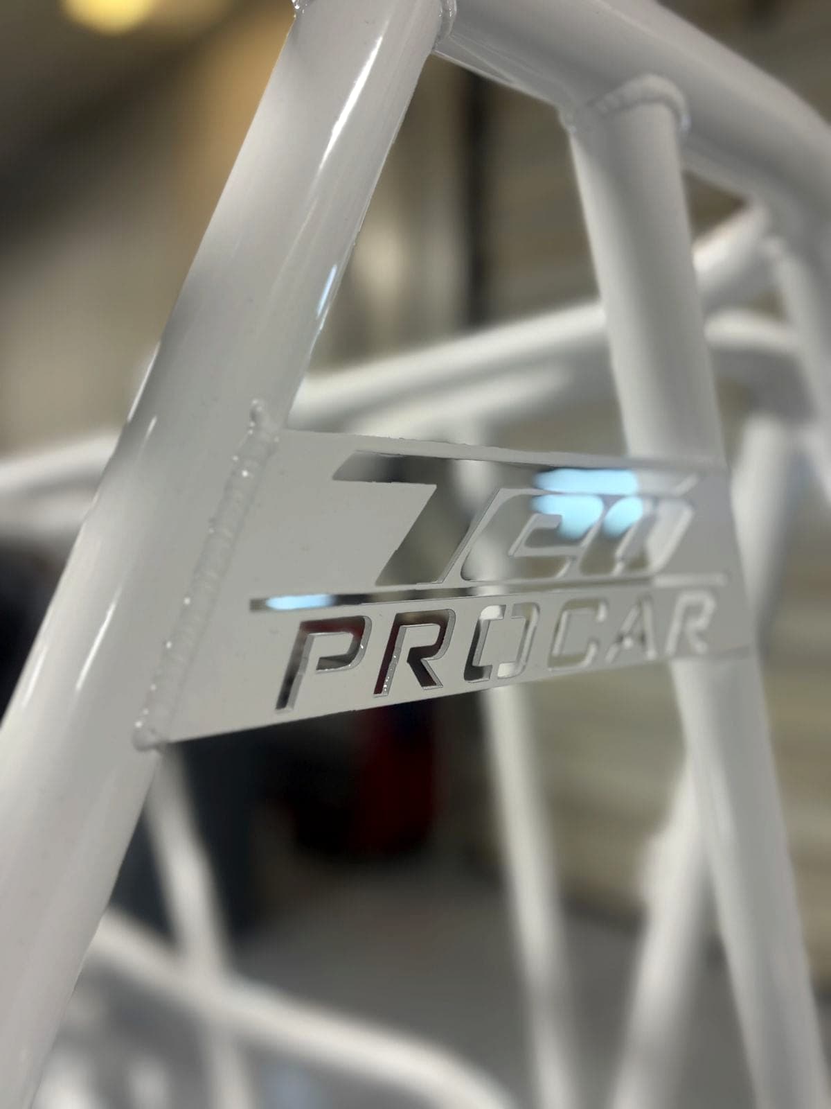 Race chassis with a laser cut Teo Pro Car plate